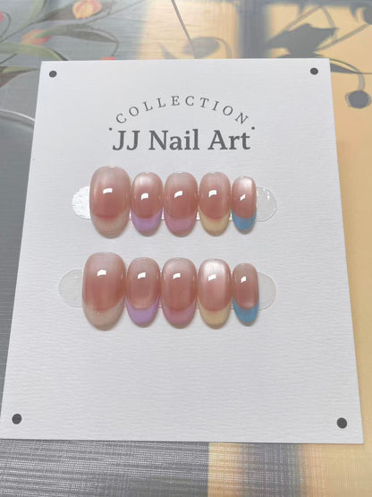 JJ Nail Art nail extensions on a display card with a floral background