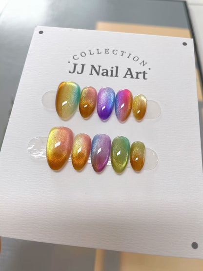 Set of colorful nail art samples on a 'JJ Nail Art' display card.