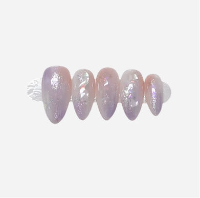 Set of pink and purple gradient false nails on a white background