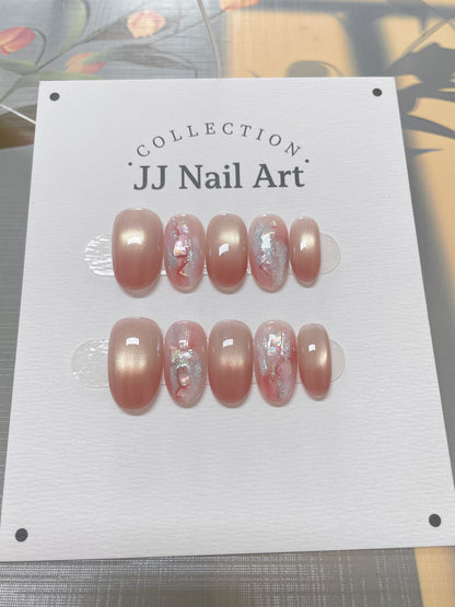 JJ Nail Art nail art collection on a white card with a floral background